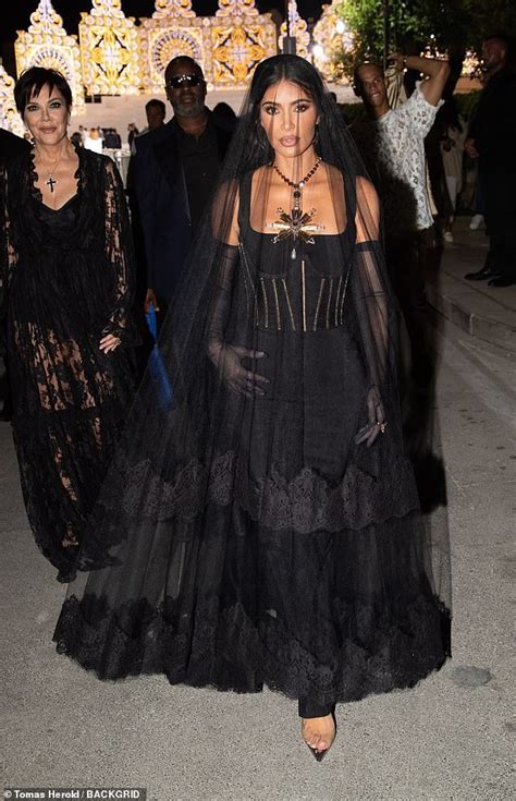 Madonna Lifts Black Veil to Show Off Daring Outfit at Dolce.